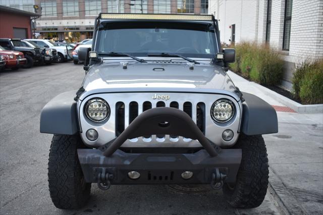 used 2015 Jeep Wrangler Unlimited car, priced at $19,797