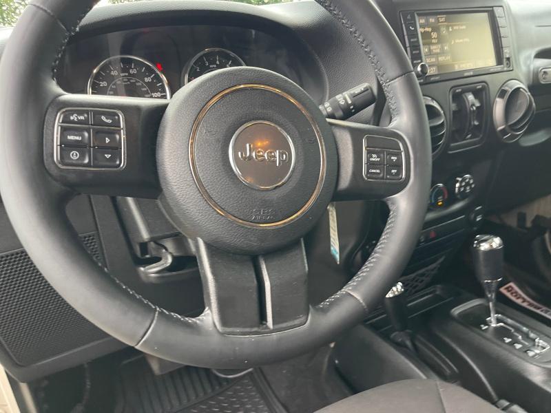 used 2017 Jeep Wrangler Unlimited car, priced at $24,977