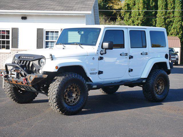 used 2015 Jeep Wrangler Unlimited car, priced at $16,979