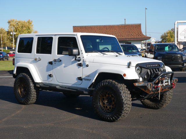 used 2015 Jeep Wrangler Unlimited car, priced at $16,979