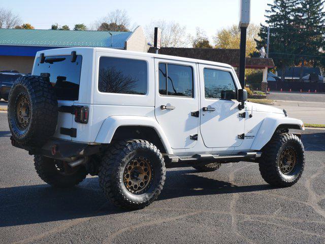 used 2015 Jeep Wrangler Unlimited car, priced at $16,979