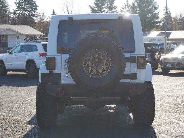 used 2015 Jeep Wrangler Unlimited car, priced at $16,979