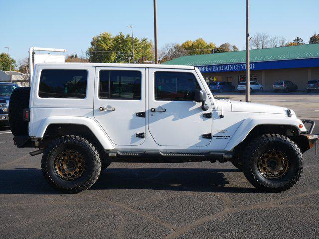used 2015 Jeep Wrangler Unlimited car, priced at $16,979