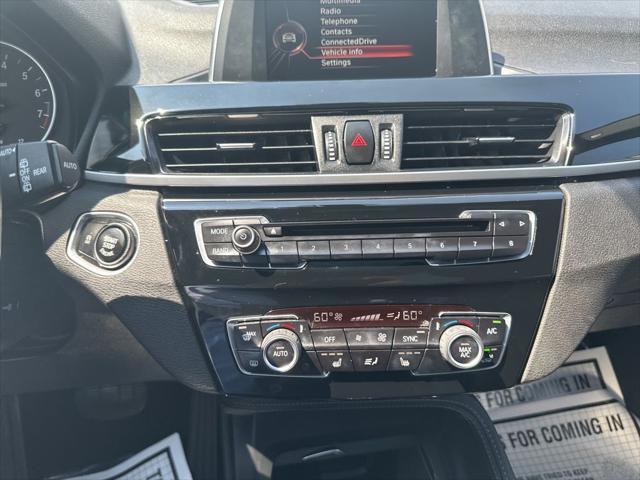used 2017 BMW X1 car, priced at $18,143
