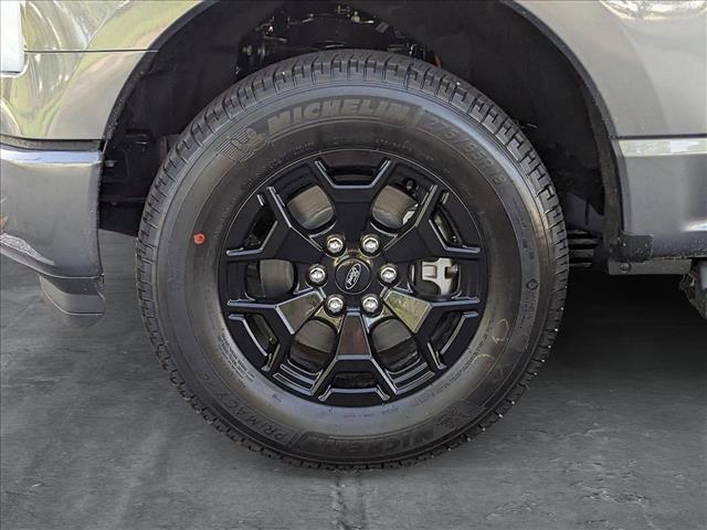 new 2025 Ford F-150 Lightning car, priced at $59,873