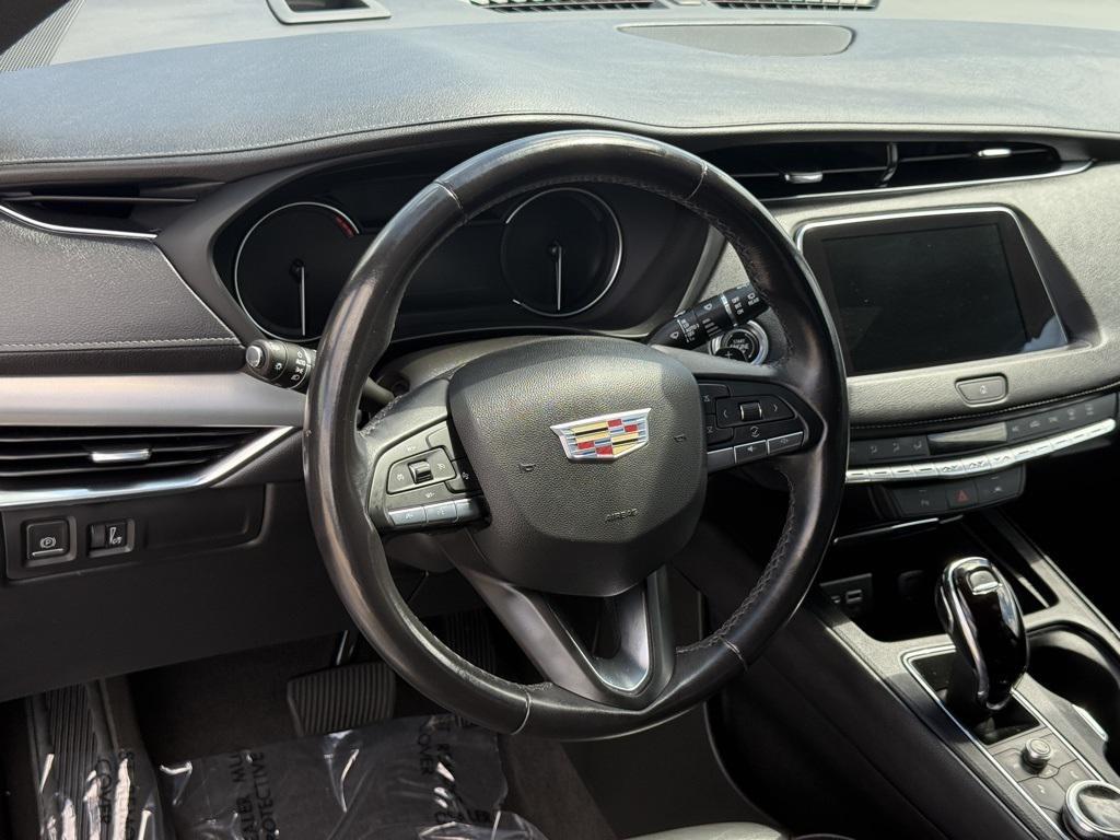 used 2023 Cadillac XT4 car, priced at $26,092