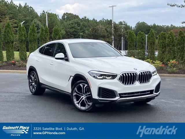used 2022 BMW X6 car, priced at $57,388