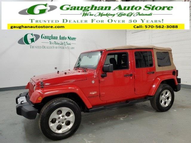 used 2014 Jeep Wrangler Unlimited car, priced at $10,998