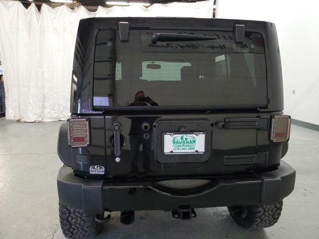 used 2015 Jeep Wrangler Unlimited car, priced at $22,998