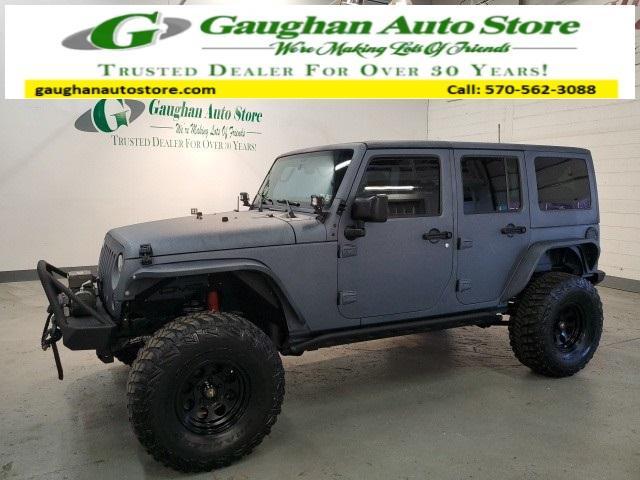 used 2015 Jeep Wrangler Unlimited car, priced at $23,998