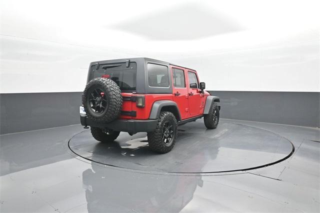 used 2012 Jeep Wrangler Unlimited car, priced at $15,658
