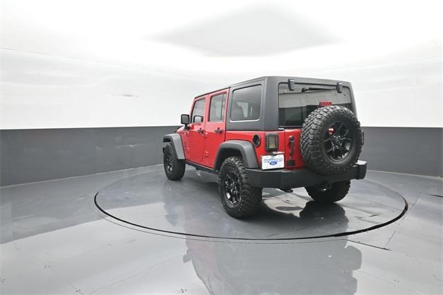used 2012 Jeep Wrangler Unlimited car, priced at $15,658