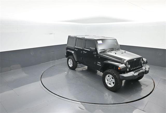 used 2017 Jeep Wrangler Unlimited car, priced at $26,453