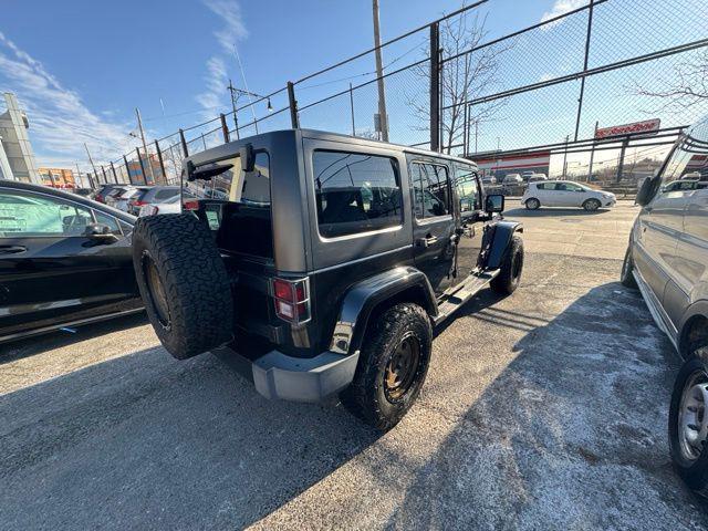 used 2016 Jeep Wrangler Unlimited car, priced at $18,763