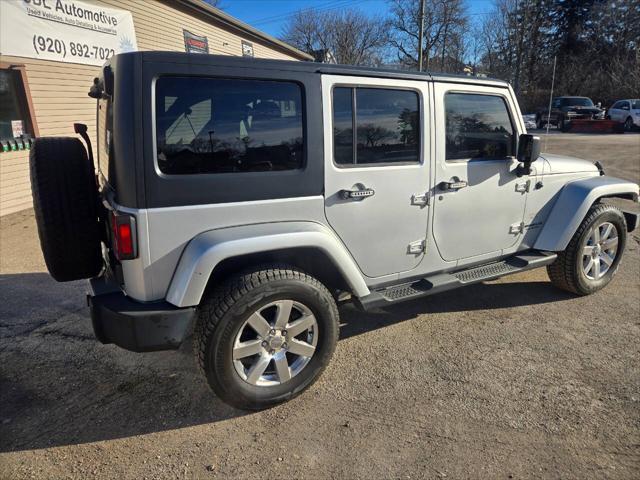 used 2012 Jeep Wrangler Unlimited car, priced at $12,995