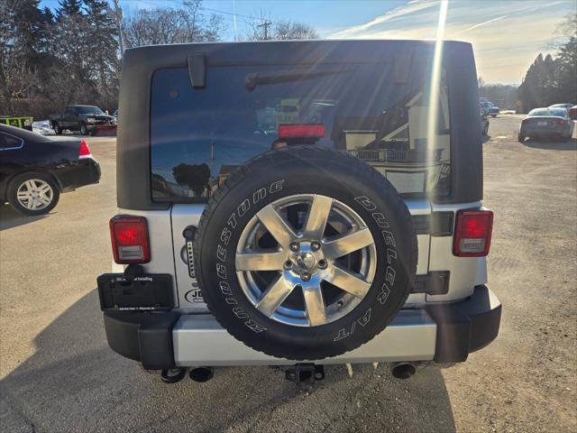 used 2012 Jeep Wrangler Unlimited car, priced at $12,995