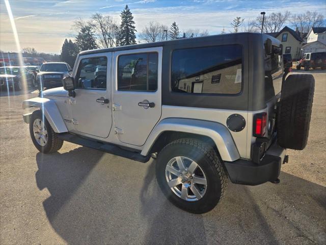 used 2012 Jeep Wrangler Unlimited car, priced at $12,995