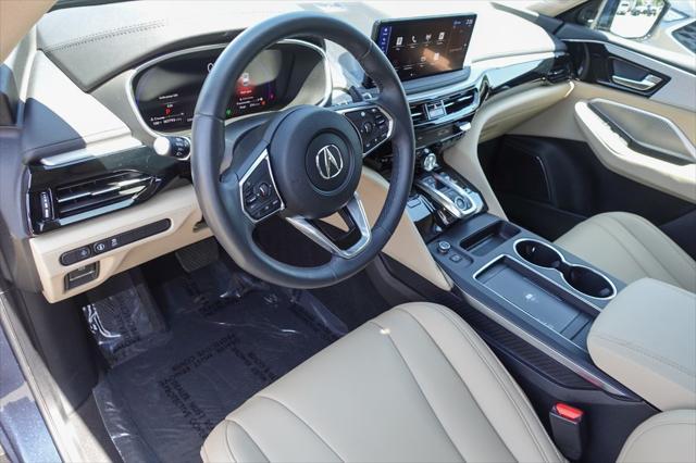 used 2025 Acura MDX car, priced at $46,877