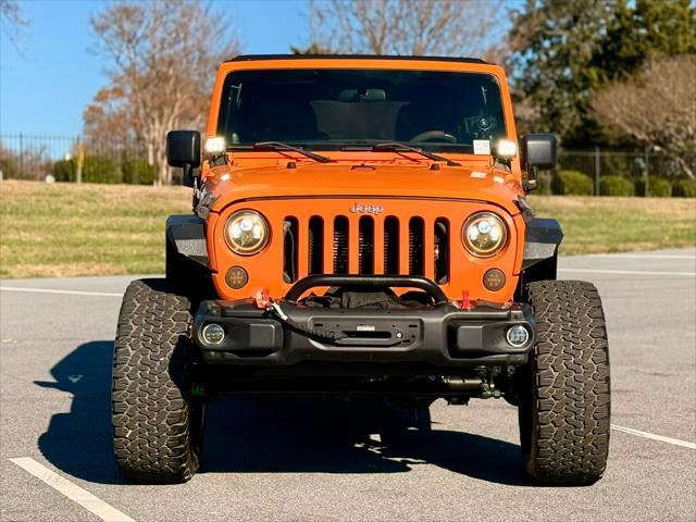 used 2012 Jeep Wrangler Unlimited car, priced at $14,999