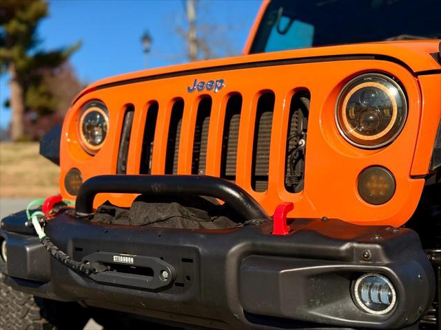 used 2012 Jeep Wrangler Unlimited car, priced at $14,999