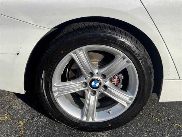 used 2014 BMW 320 car, priced at $7,988