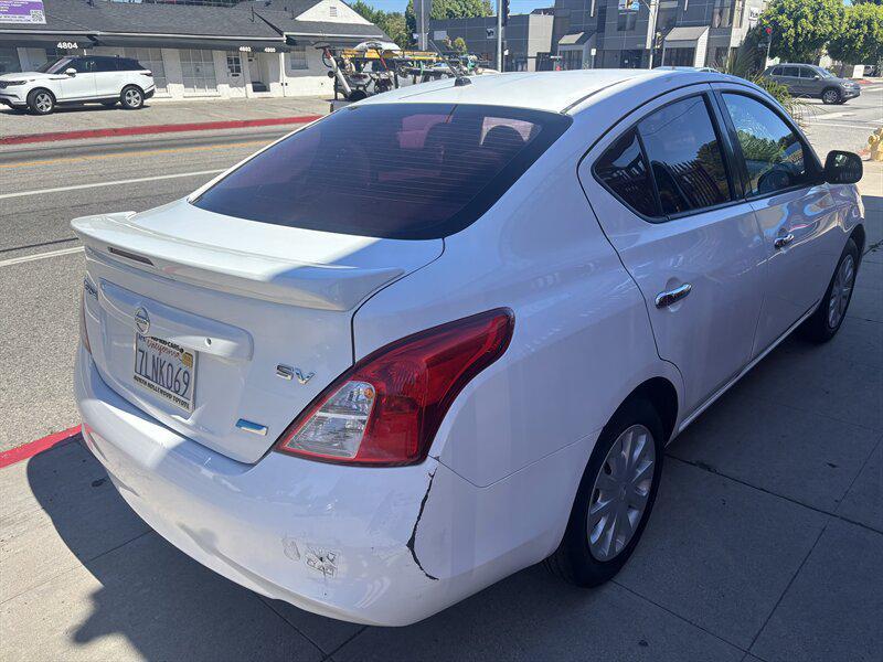 used 2014 Nissan Versa car, priced at $4,988