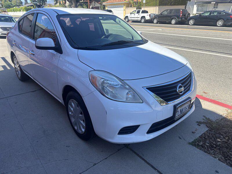 used 2014 Nissan Versa car, priced at $4,988