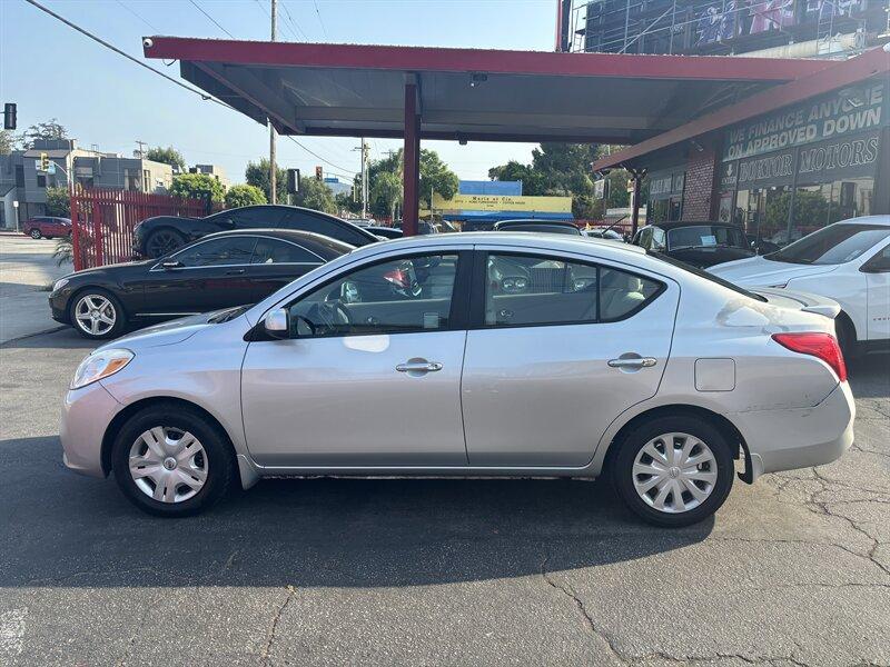 used 2013 Nissan Versa car, priced at $4,988