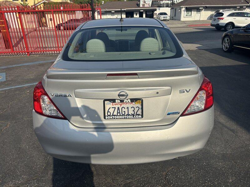 used 2013 Nissan Versa car, priced at $4,988