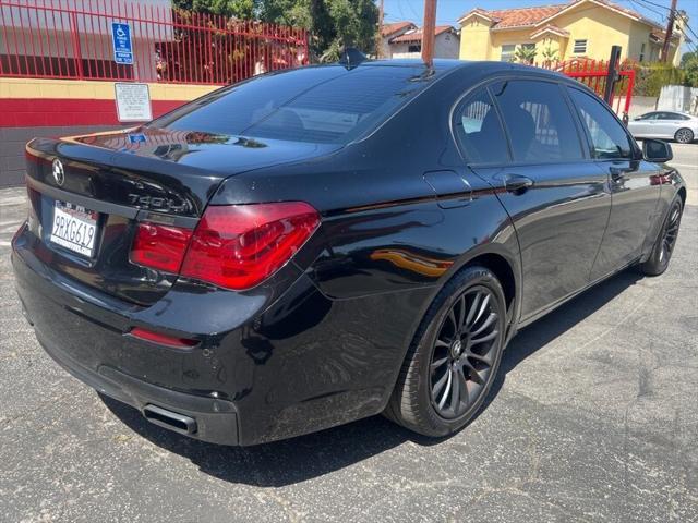 used 2011 BMW 750 car, priced at $8,888