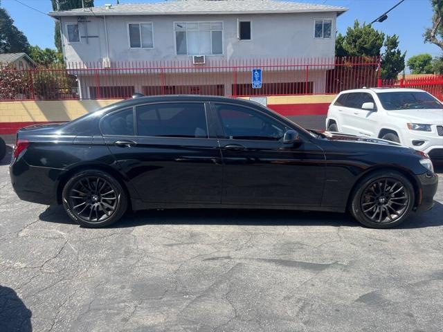 used 2011 BMW 750 car, priced at $8,888