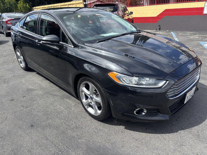 used 2014 Ford Fusion car, priced at $3,988
