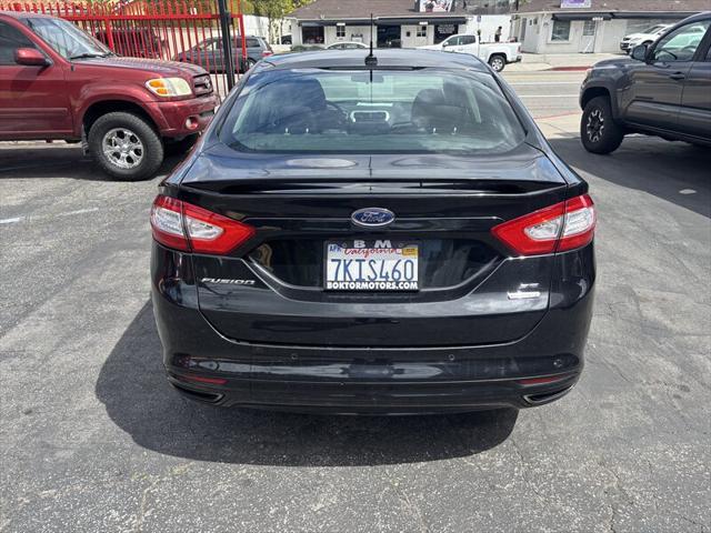 used 2014 Ford Fusion car, priced at $4,588