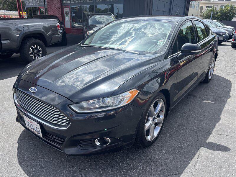 used 2014 Ford Fusion car, priced at $3,988