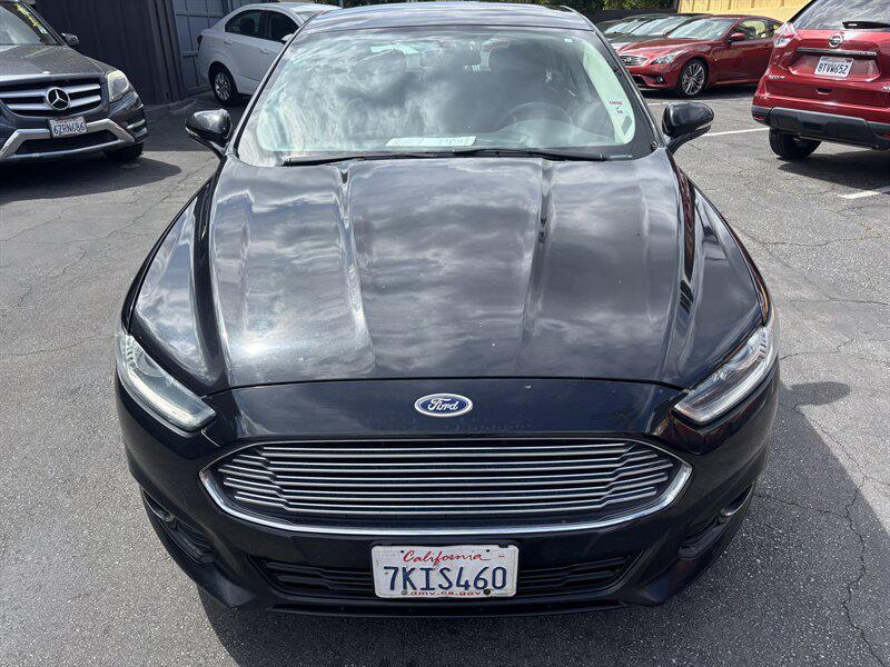 used 2014 Ford Fusion car, priced at $3,988
