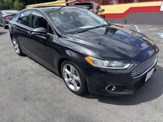 used 2014 Ford Fusion car, priced at $4,588