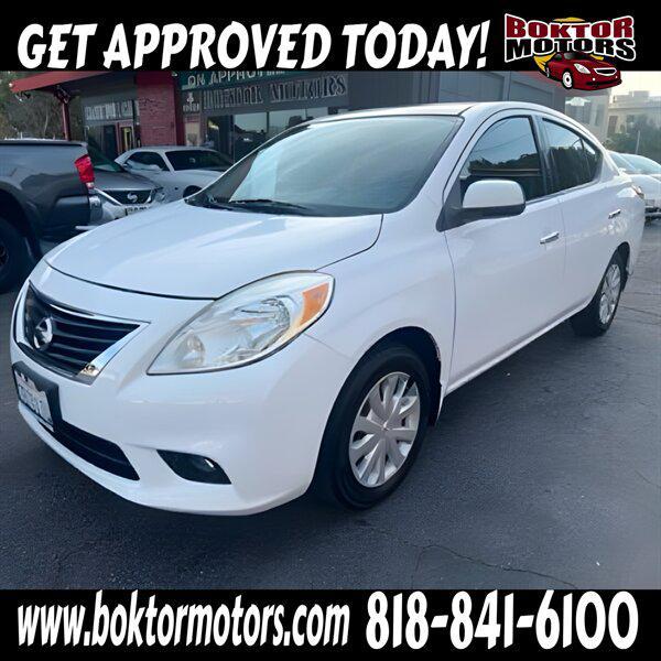 used 2014 Nissan Versa car, priced at $7,988