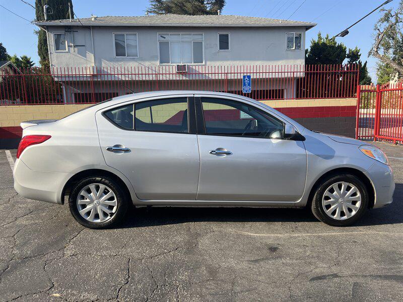 used 2013 Nissan Versa car, priced at $3,988