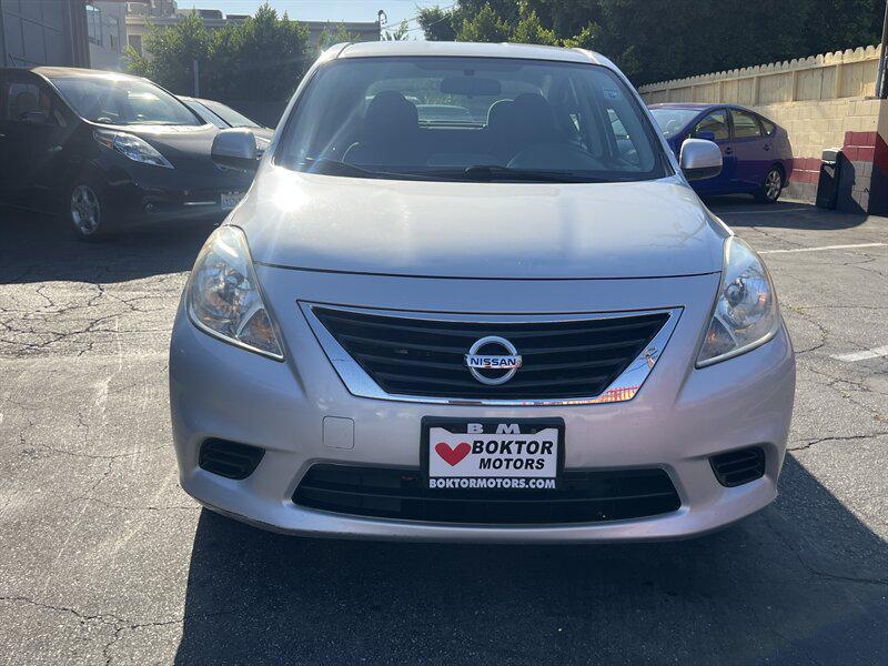 used 2013 Nissan Versa car, priced at $3,988