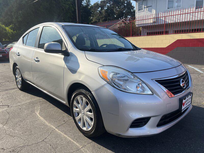 used 2013 Nissan Versa car, priced at $3,988