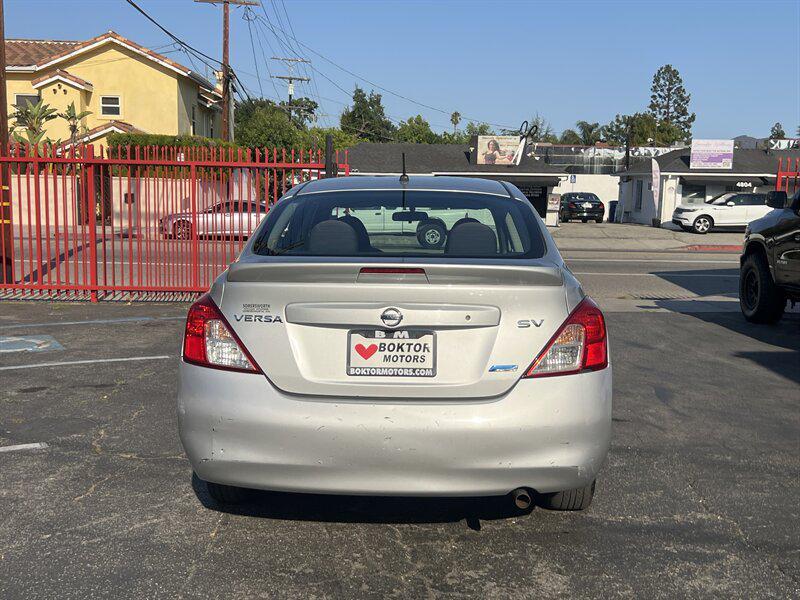 used 2013 Nissan Versa car, priced at $3,988
