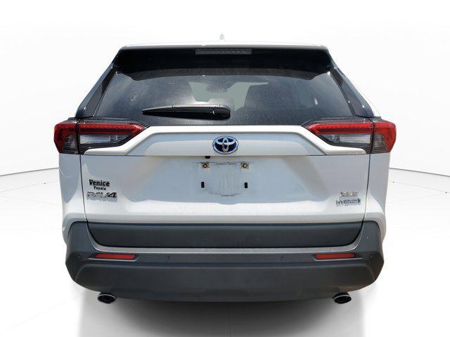 used 2021 Toyota RAV4 Hybrid car, priced at $28,877