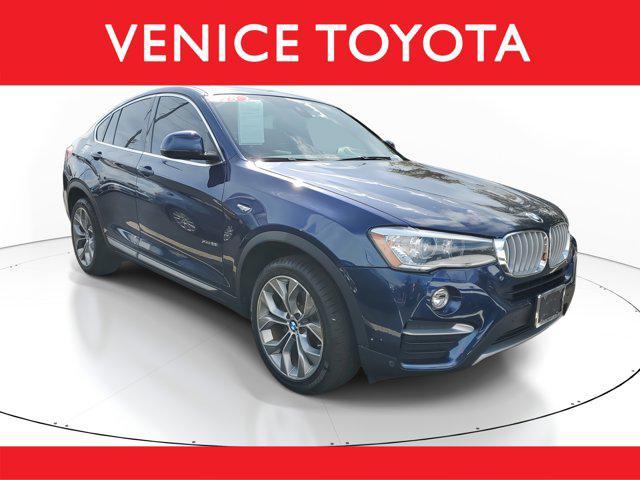 used 2018 BMW X4 car, priced at $17,900