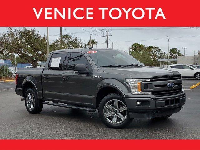 used 2018 Ford F-150 car, priced at $24,233