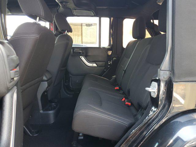 used 2015 Jeep Wrangler Unlimited car, priced at $15,309