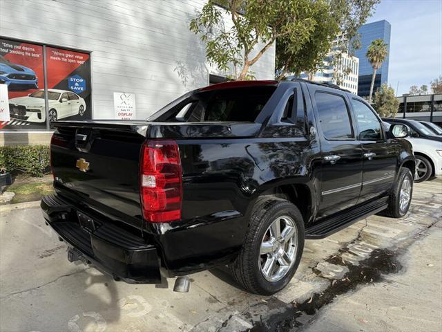 used 2013 Chevrolet Avalanche car, priced at $13,998