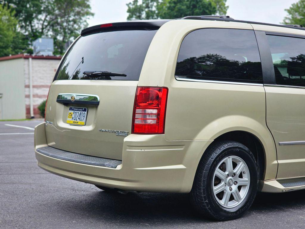 used 2010 Chrysler Town & Country car, priced at $5,499