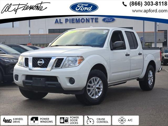 used 2014 Nissan Frontier car, priced at $11,877