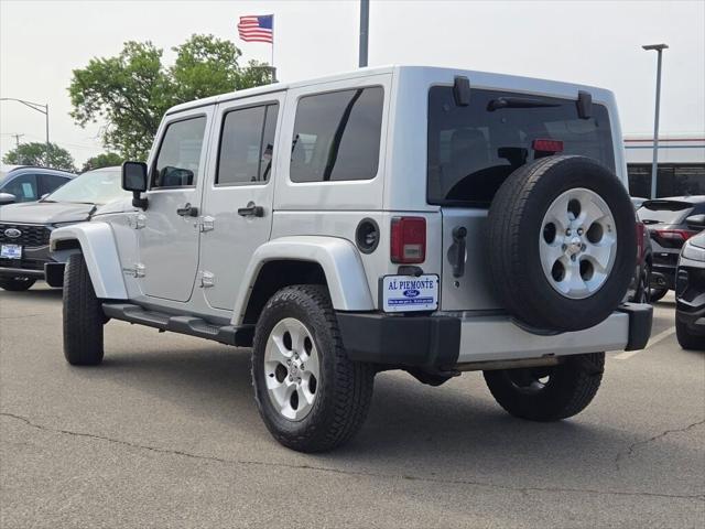 used 2011 Jeep Wrangler Unlimited car, priced at $9,000