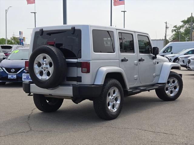 used 2011 Jeep Wrangler Unlimited car, priced at $9,000